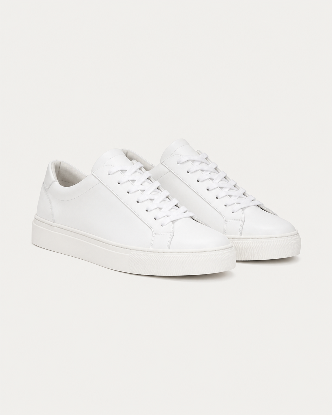 White minimal low-top sneakers